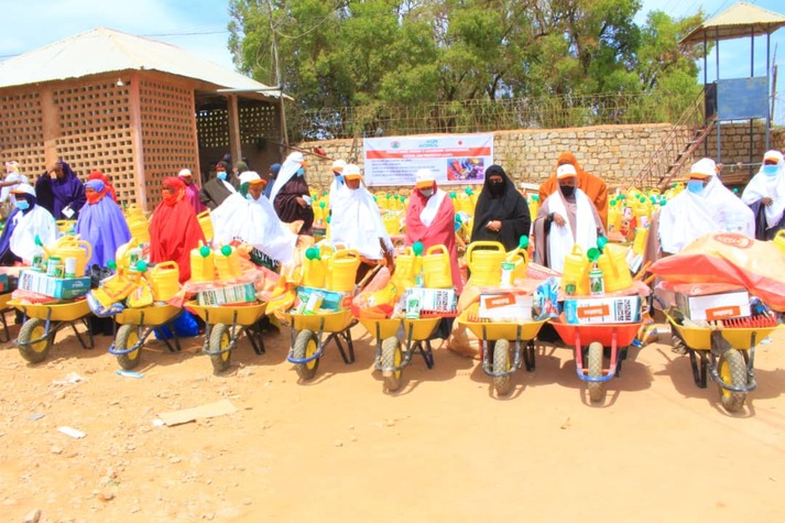 Women receiving the farming tools and seeds in Baidoa.jpg
